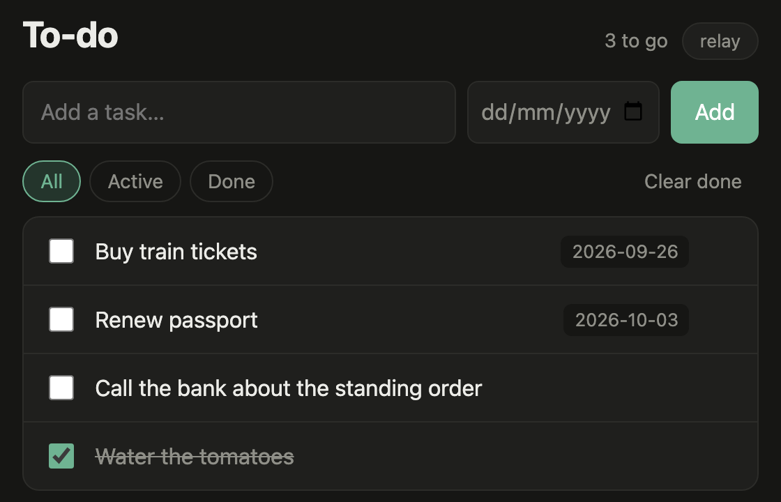 Your to-do list: 'Buy train tickets' due on the 26th, two other tasks, one done.